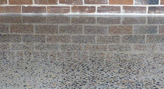 Concrete Grinding Exposed Stone Close Up Quality Sheen