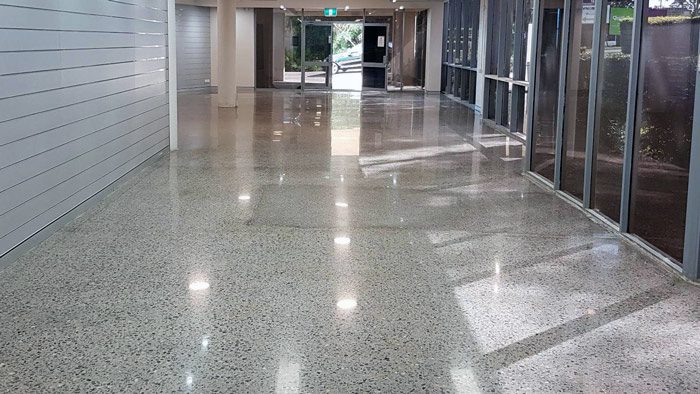Concrete Grinding Exposed Stone Close Up Quality Sheen